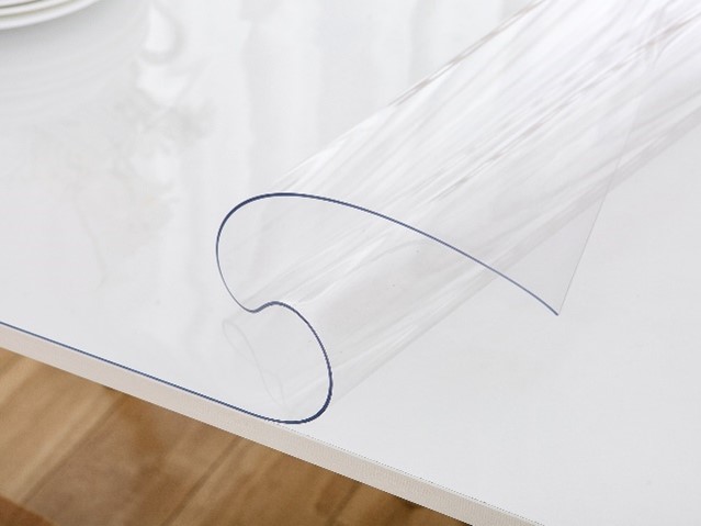 Nappe transparente Cristal Clear unie en rouleau de 140 cm x 15 m, épaisseur 80/100ème, idéale pour protection de table.