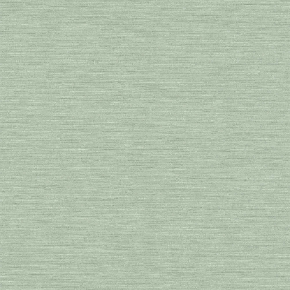 Papier peint vinyle grainé sur intissé uni vert jade, offrant un relief subtil