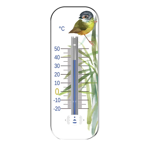 Thermomètre à liquide avec un décor illustrant un oiseau sur des roseaux, gradué de -20°C à +50°C.