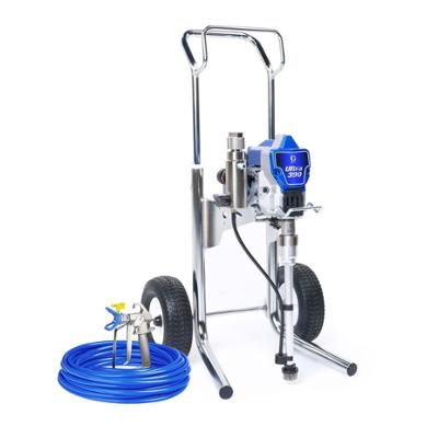 Pulvérisateur de peinture professionnel airless Graco Ultra 390 sur chariot avec pistolet et tuyau bleu.